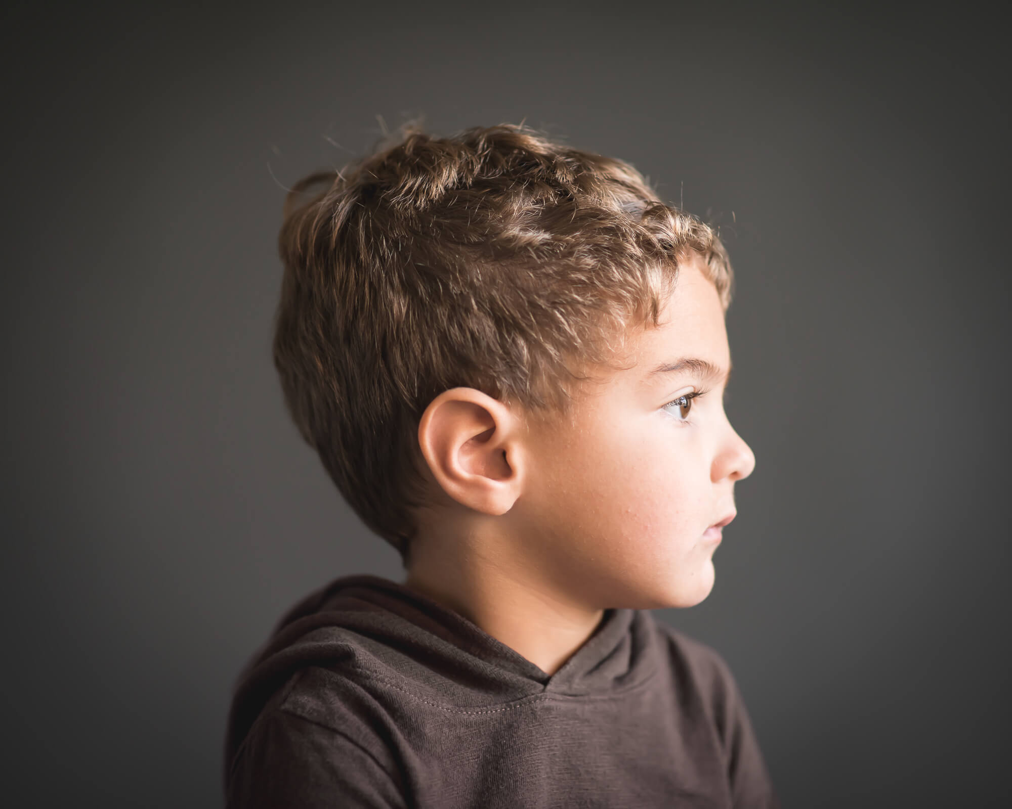 small boy profile in studio portrait