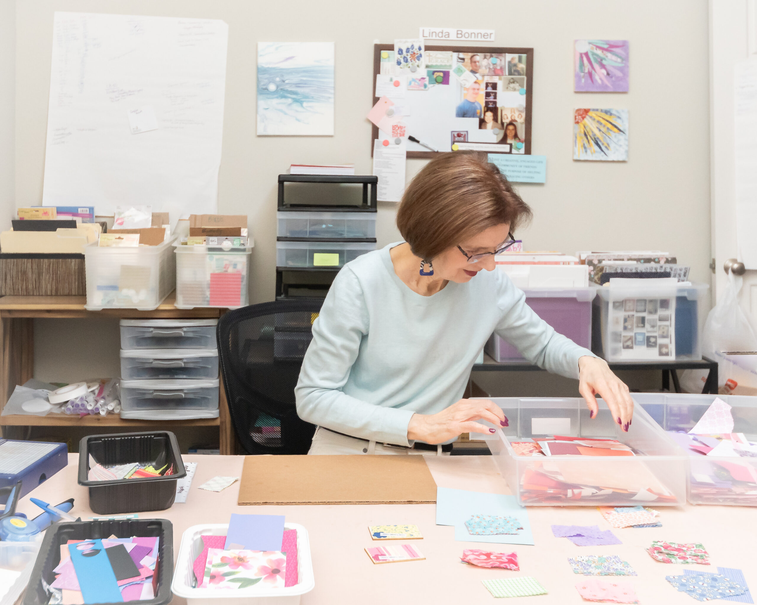 Card maker in her studio creating cards