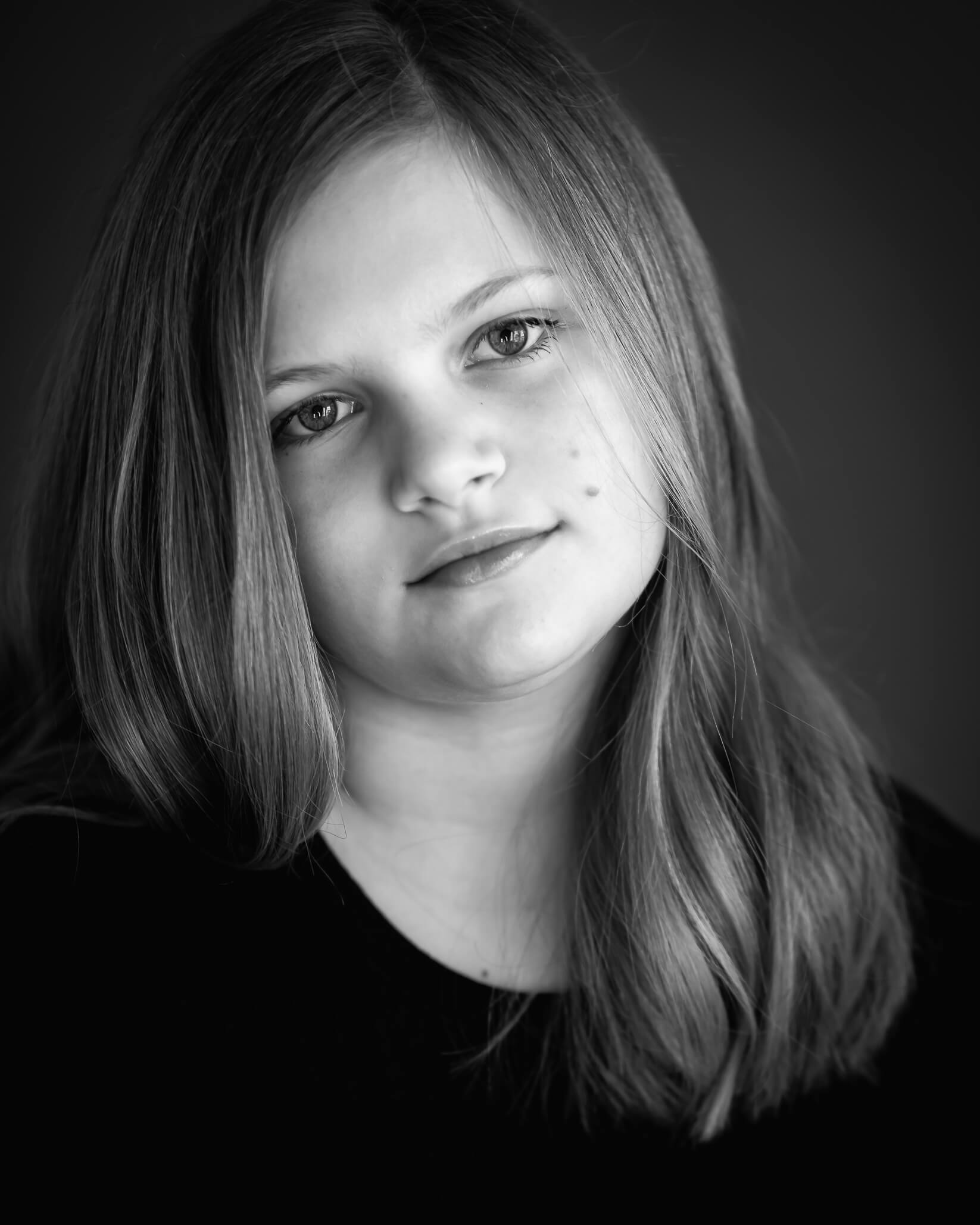 black & white studio portrait of 10 year old child captured by Allison Amores Photography Dallas Children's Photographer 