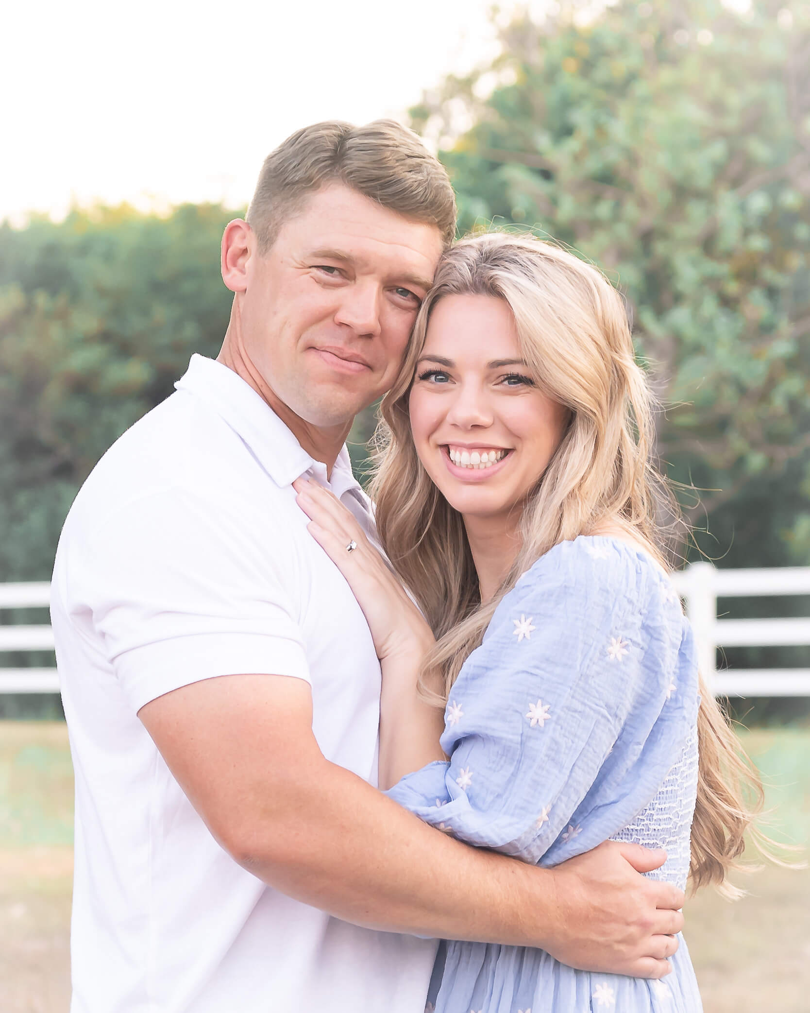 Portrait of parents hugging in Erwin park for beautiful family mini session captured by Allison Amores Photography