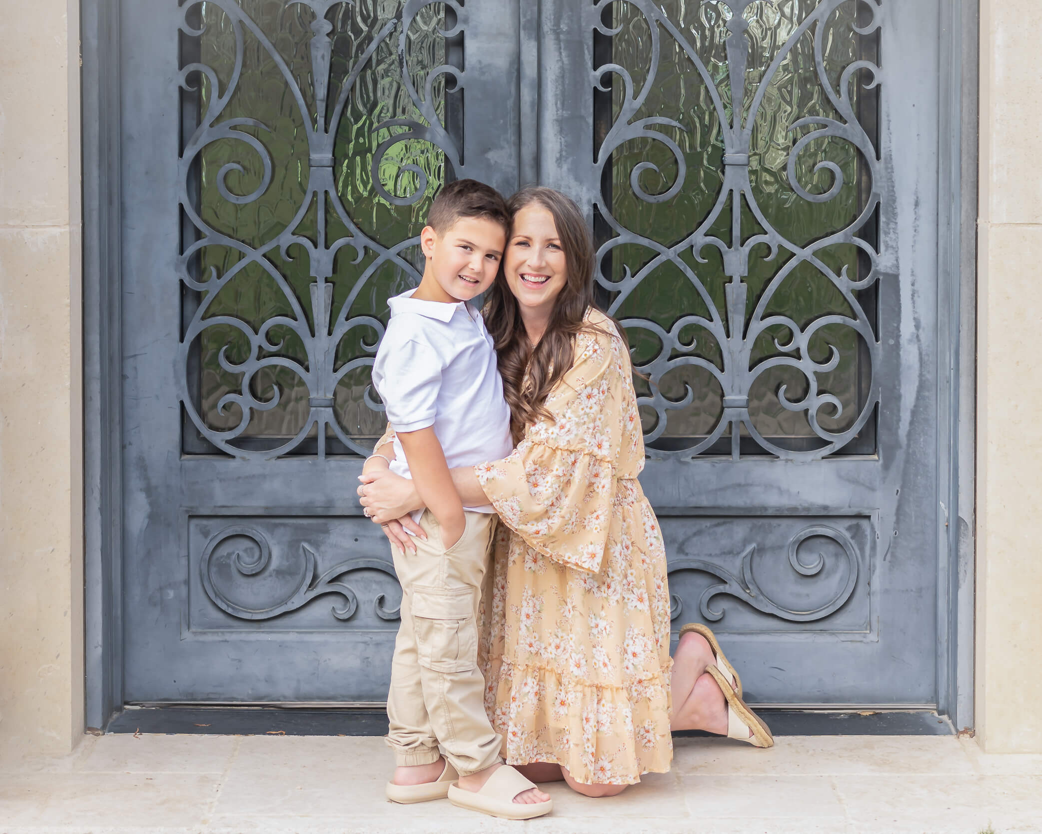 Mom and son in Adriatica after mom had her makeup done for her family photo session