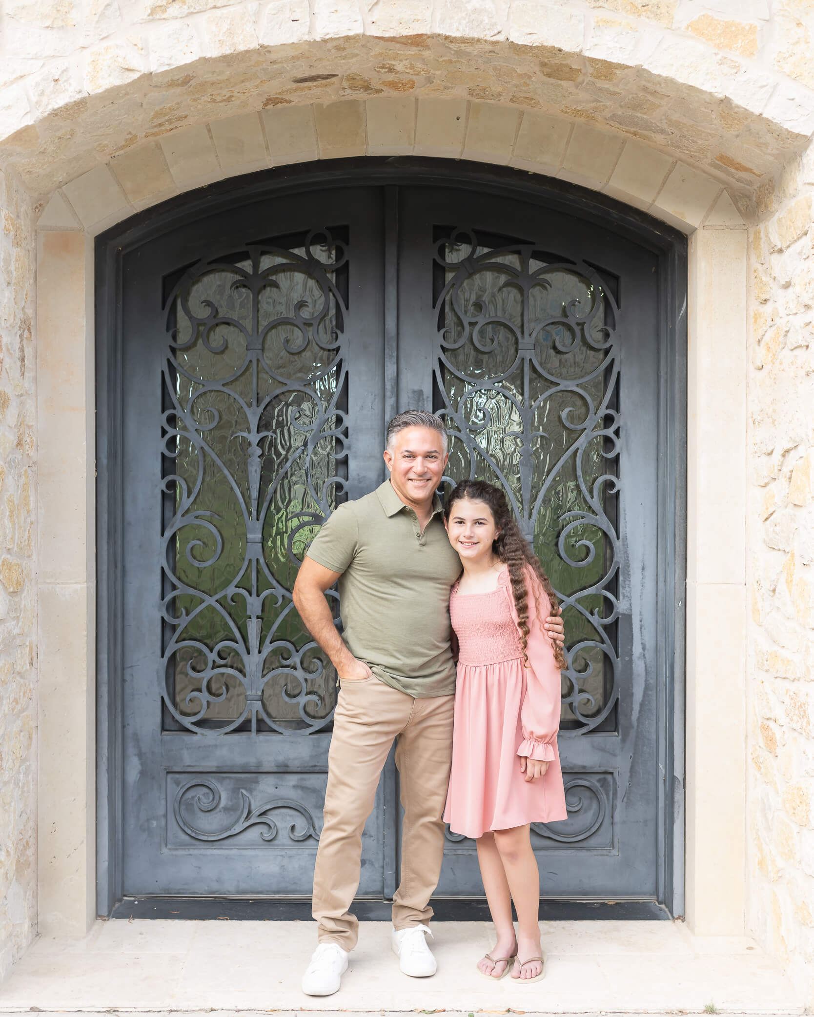 dad and daughter in doorway in adriatica 